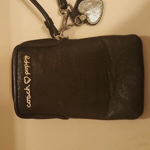 Coach Poppy phone wallet.